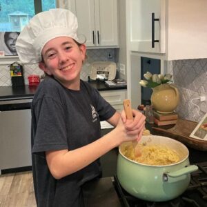 raising daughters in faith may look like cooking in the kitchen together.

