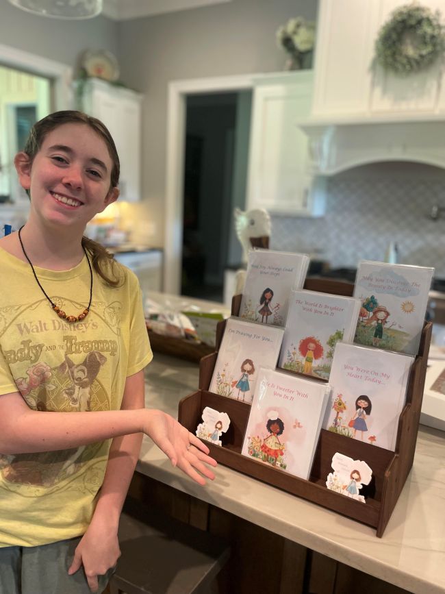 millie grace showing off the card display